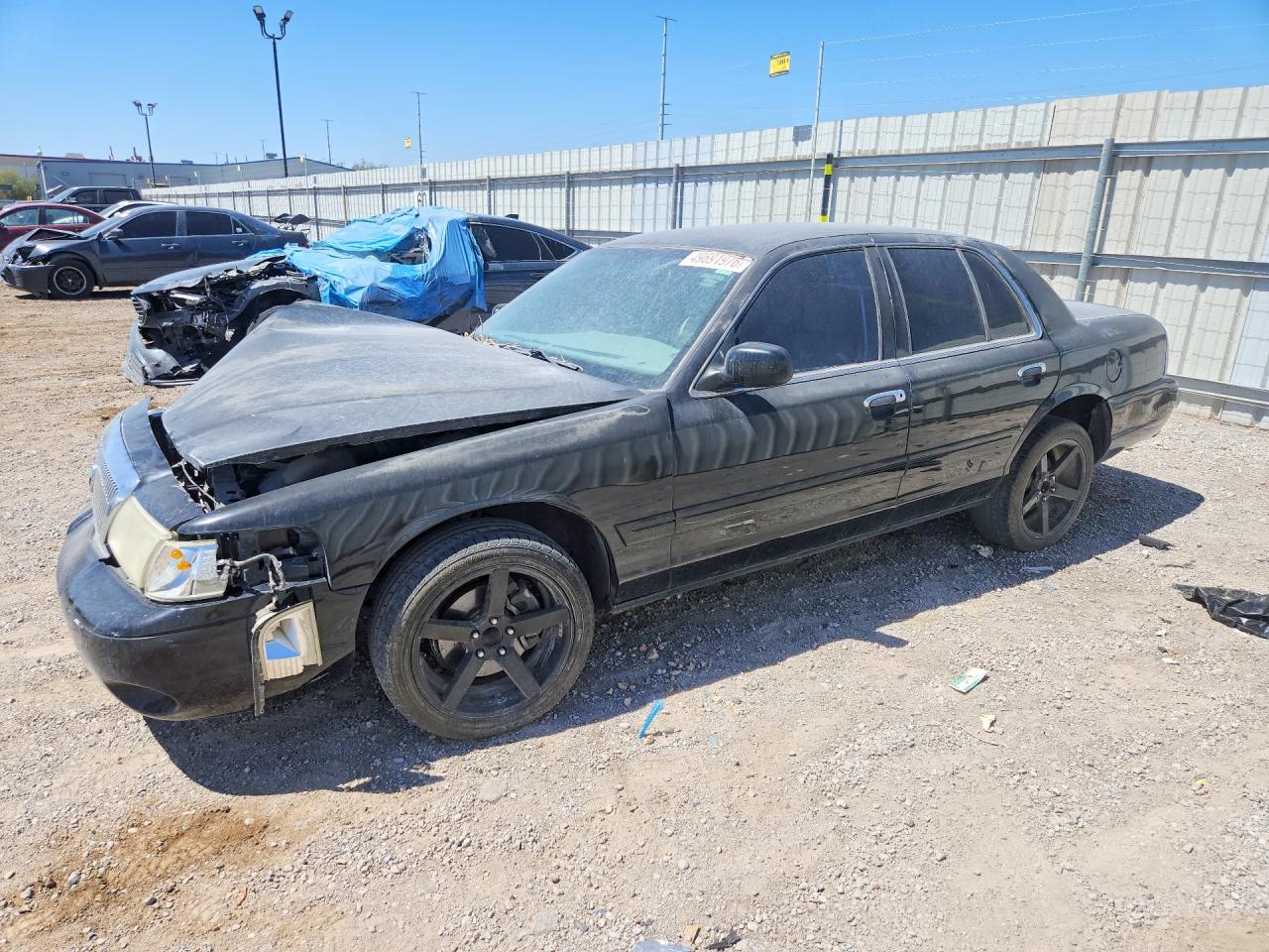 2005 Mercury Grand Marquis GS, VIN 2MEFM74W45X603742 — Front end