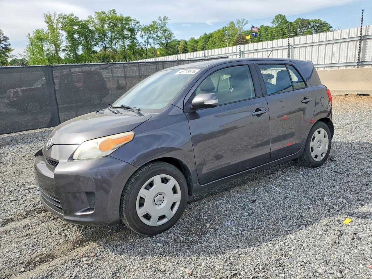 2011 Scion xD, VIN JTKKU4B42B1013195 — Зад