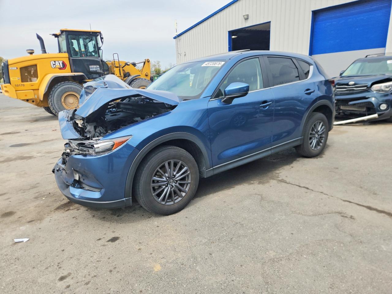 2021 Mazda CX-5 Touring, VIN JM3KFBCM3M0476208 — Front end