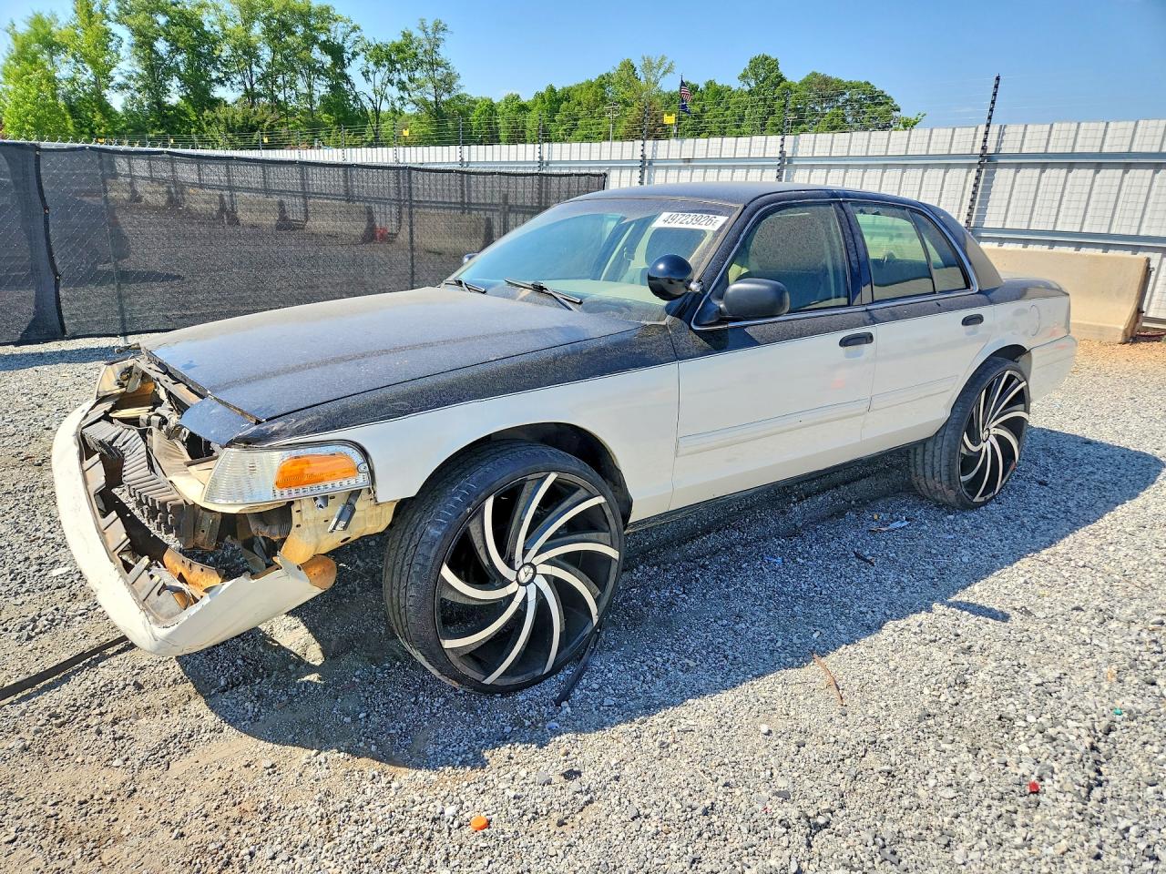 2009 Ford Police Interceptor, VIN 2FAHP71VX9X114917 — Side