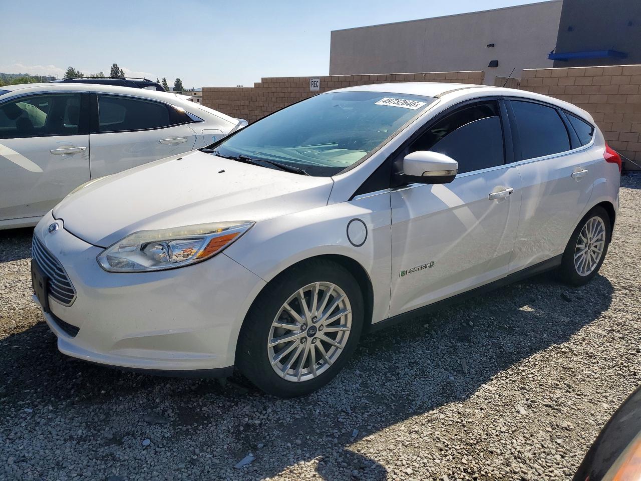 2015 Ford Focus Electric, VIN 1FADP3R41FL211080 — Minor dents and scratches