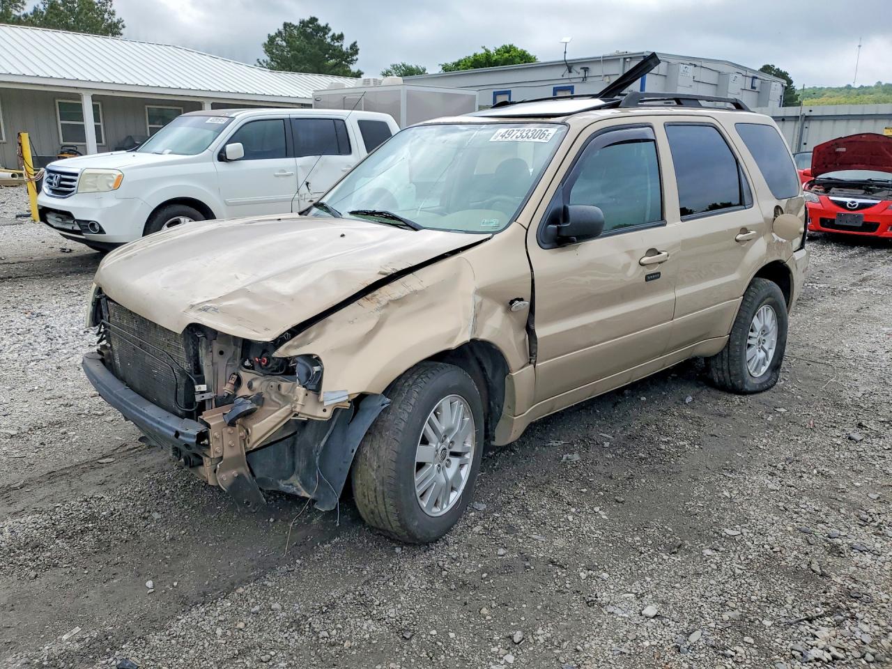 2007 Mercury Mariner Luxury, VIN 4M2YU81117KJ19584 — Rollover