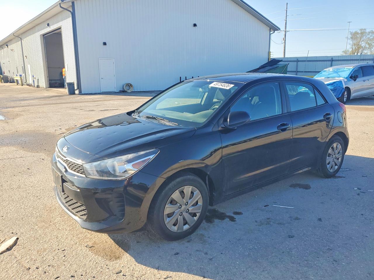 2020 Kia Rio S, VIN 3KPA25AD3LE333821 — Side