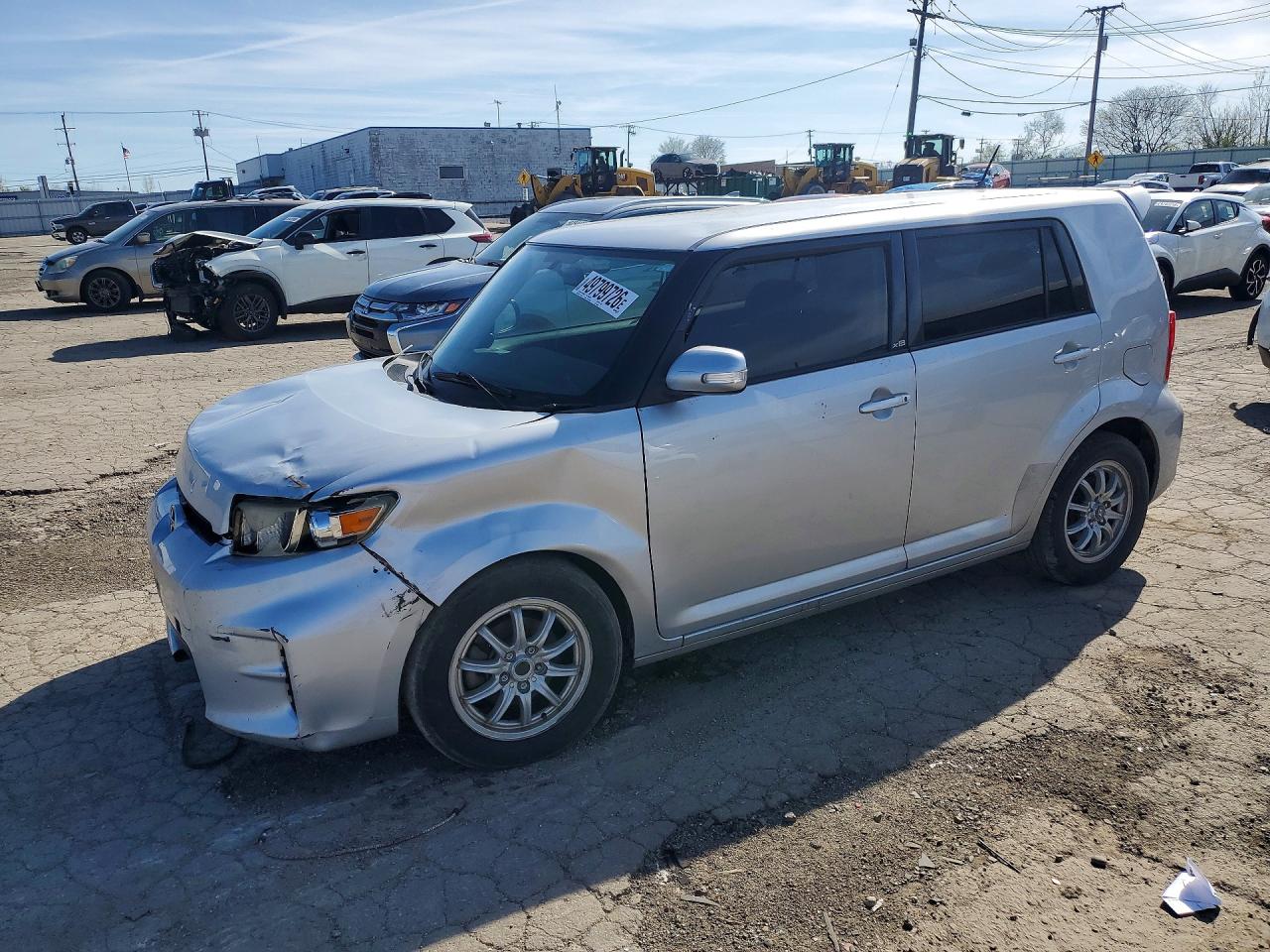 2012 Scion xB Release Series 9.0, VIN JTLZE4FE8CJ014945 — Hail