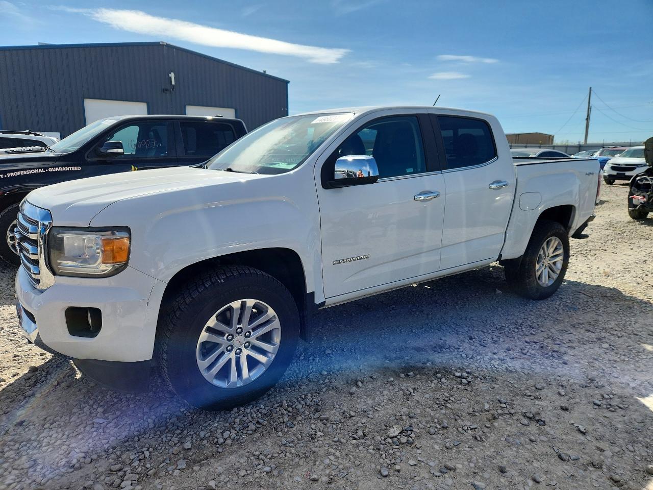 2018 GMC Canyon 4WD SLT, VIN 1GTG6DEN6J1242182 — Minor dents and scratches