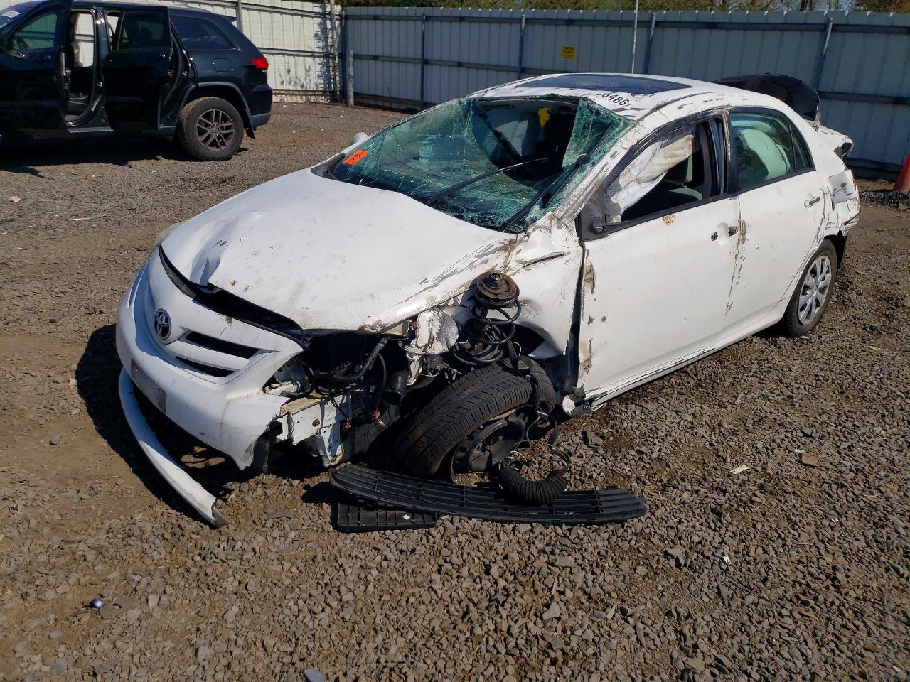 2011 Toyota Corolla LE, VIN 2T1BU4EEXBC688820 — Rollover
