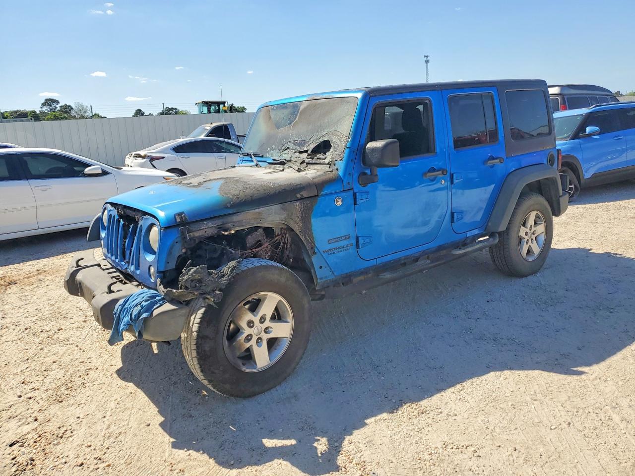 2015 Jeep Wrangler Unlimited Sport, VIN 1C4BJWDG5FL555940 — Vandalism