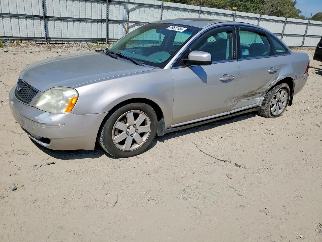 2006 Ford Five Hundred SEL, VIN 1FAFP24166G180210 — Side