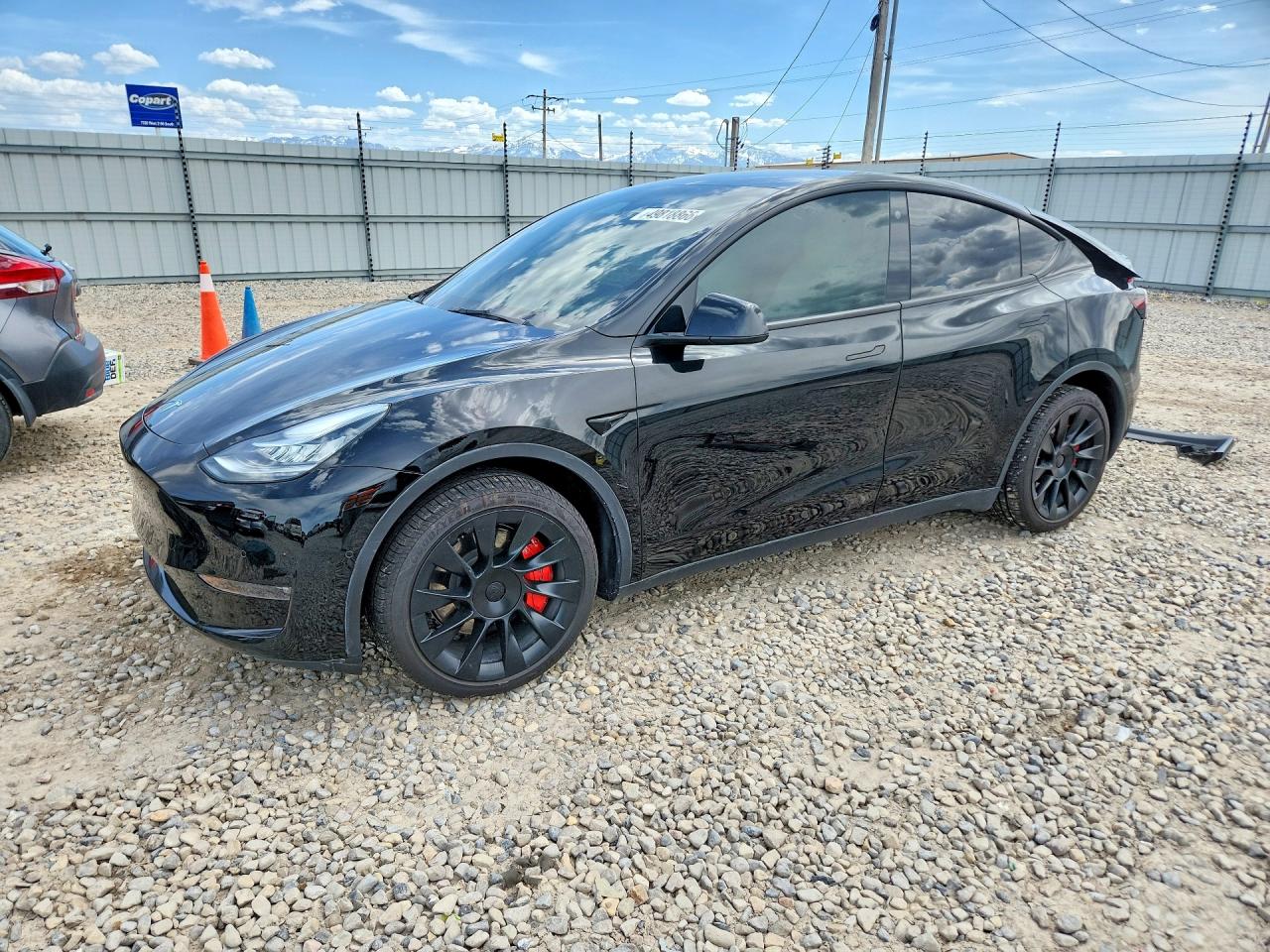 2021 Tesla Model Y Long Range, VIN 5YJYGDEEXMF302980 — Rear end