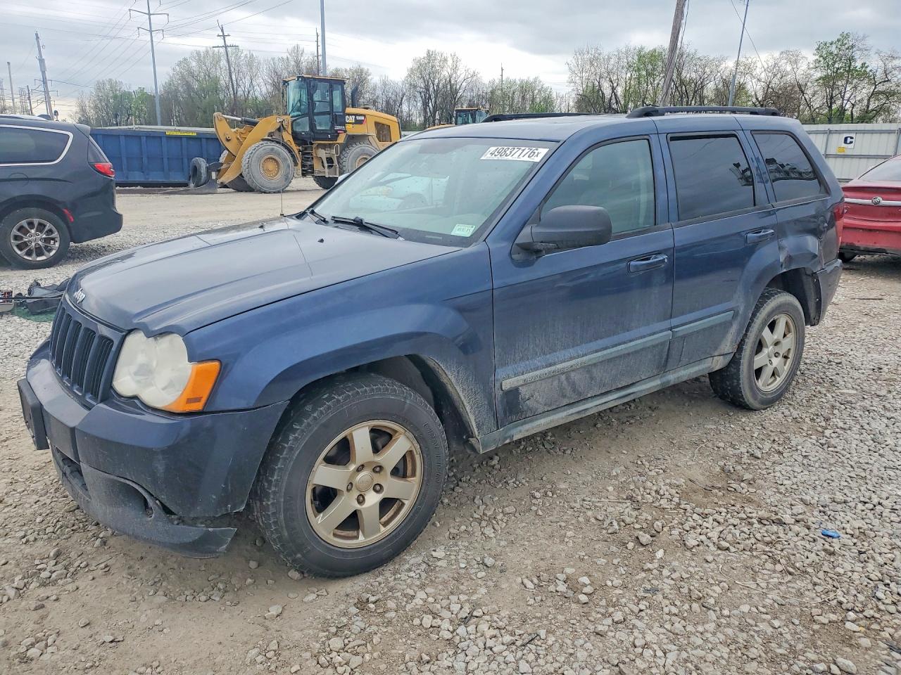 2009 Jeep Grand Cherokee Laredo, VIN 1J8GR48KX9C538663 — Rear end