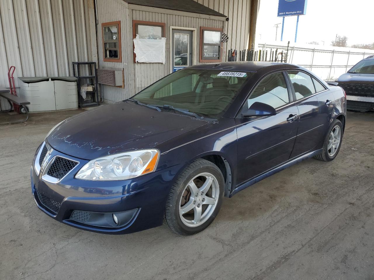 2009 Pontiac G6 1SB, VIN 1G2ZJ57K994261811 — Undercarriage