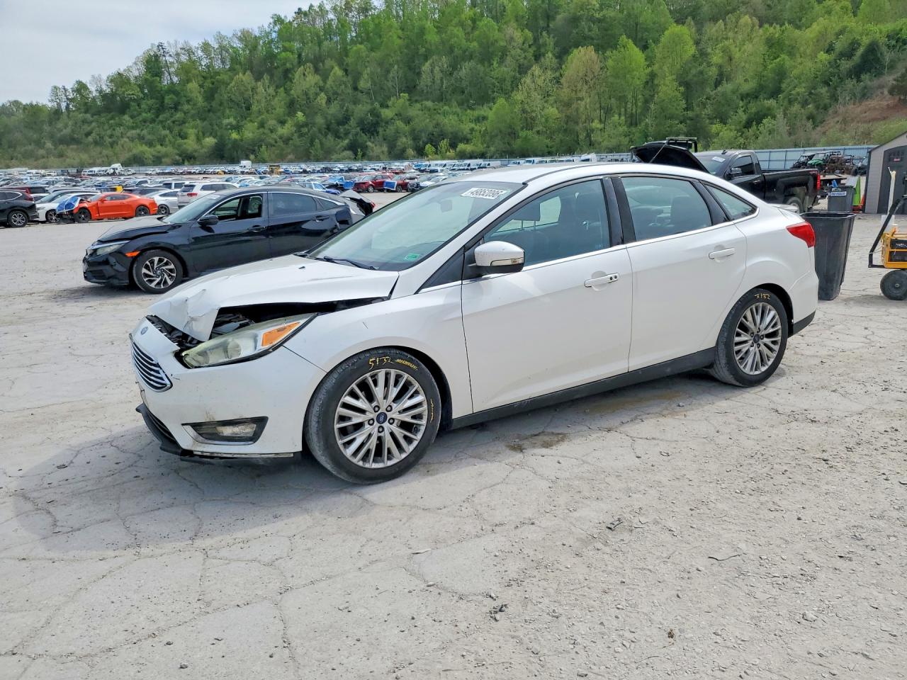 2016 Ford Focus Titanium, VIN 1FADP3J22GL378298 — Front end