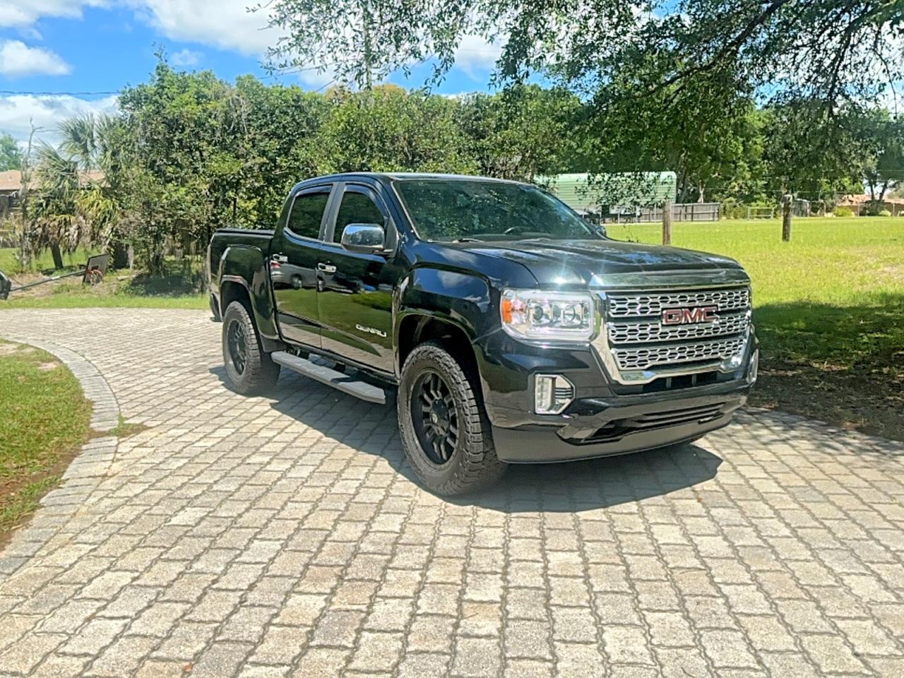2021 GMC Canyon 2WD Denali, VIN 1GTG5EEN9M1171878 — Prior damage history