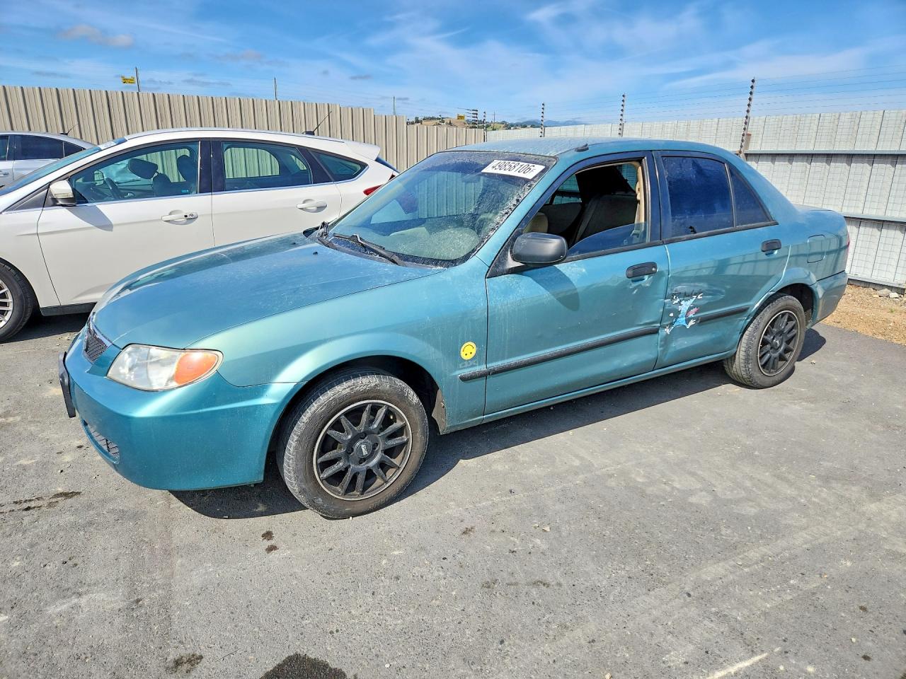 2001 Mazda Protege DX, VIN JM1BJ222510456092 — Бок
