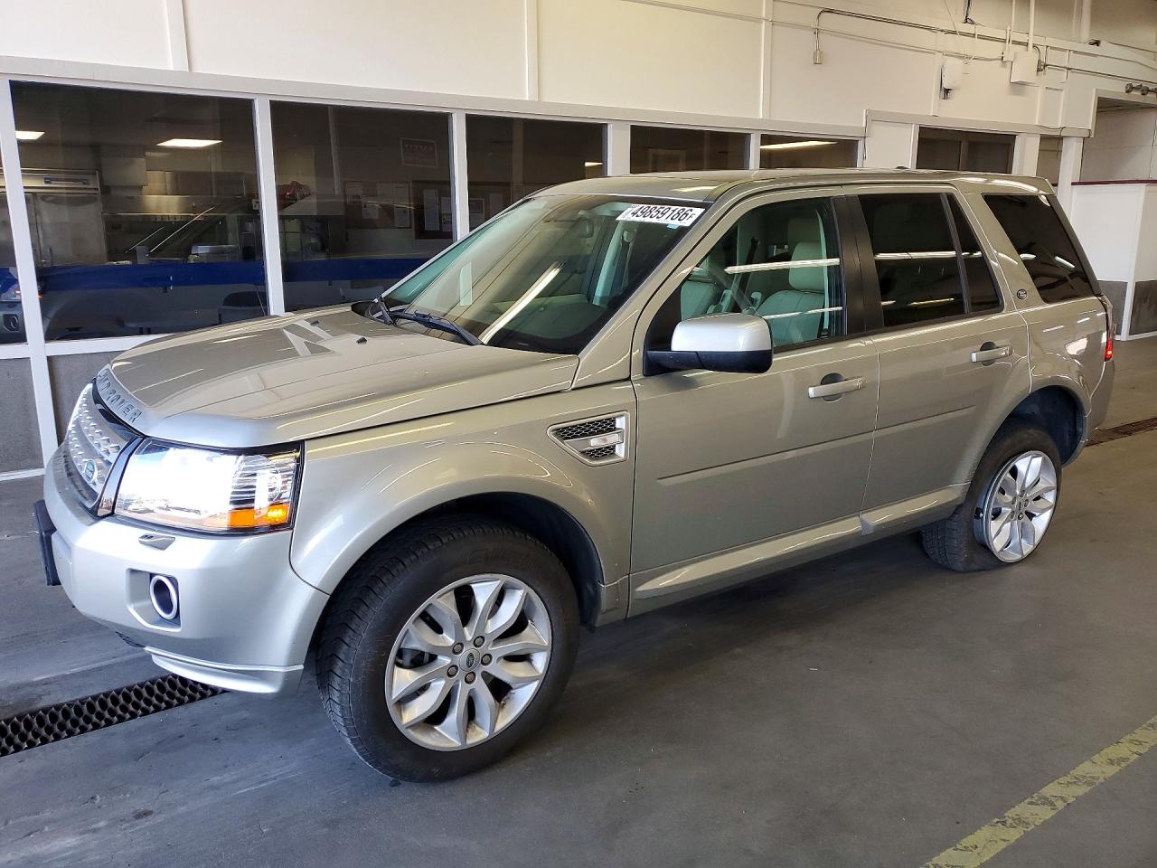 2013 Land Rover LR2, VIN SALFR2BGXDH373469 — Side