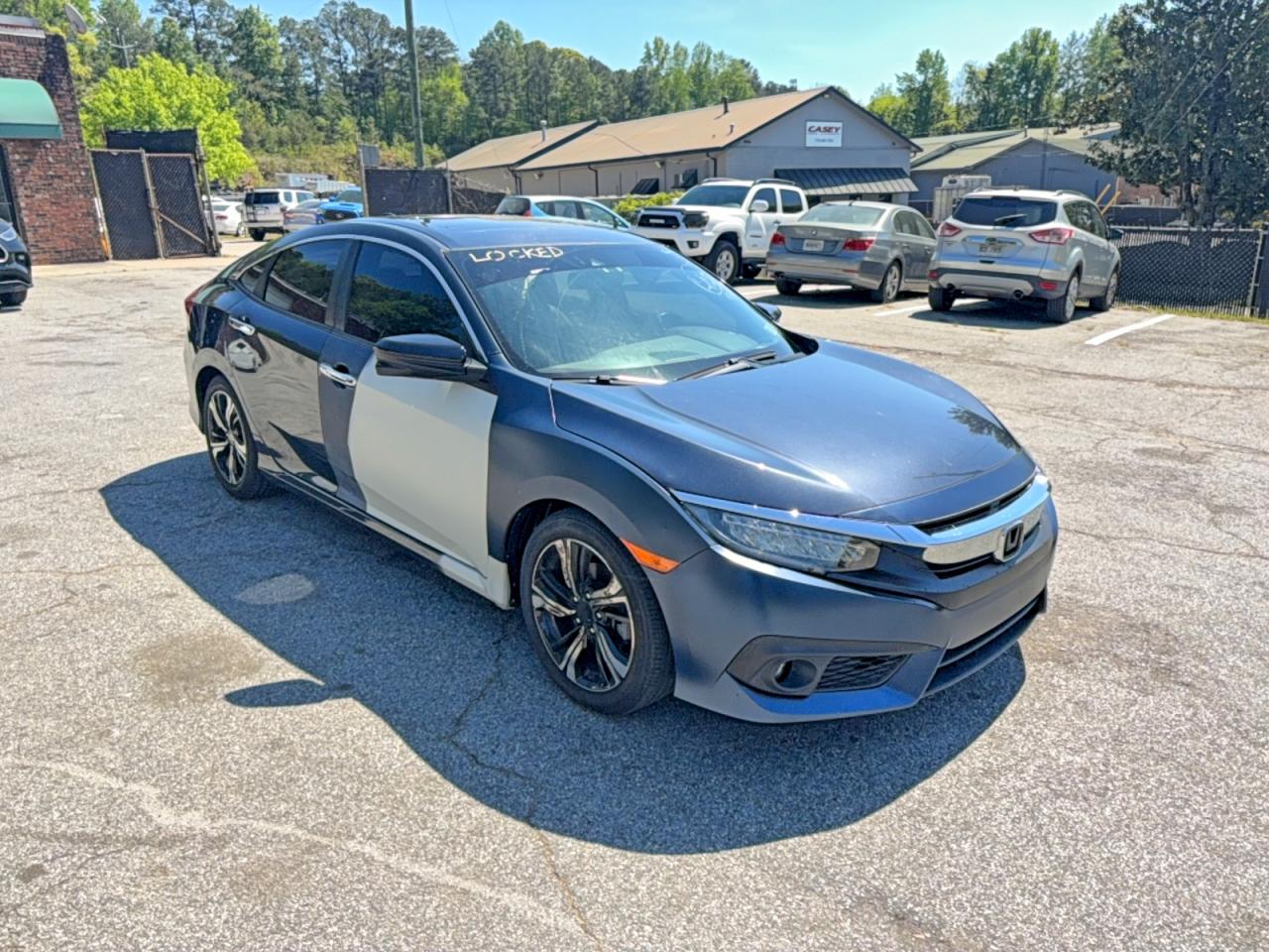 2018 Honda Civic Touring, VIN JHMFC1F90JX013058 — Partial repair