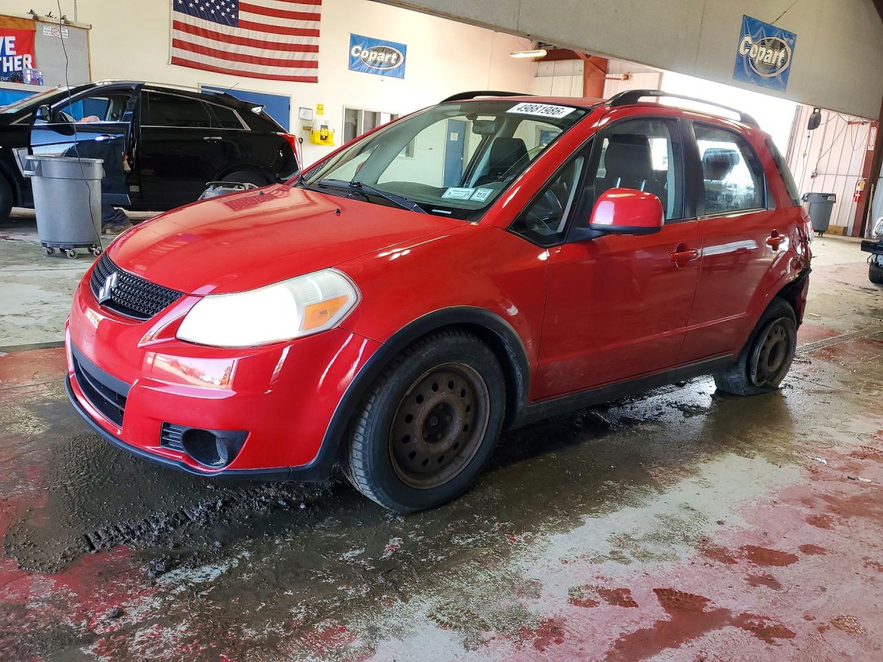 2010 Suzuki SX4, VIN JS2YB5A36A6300097 — Rear end
