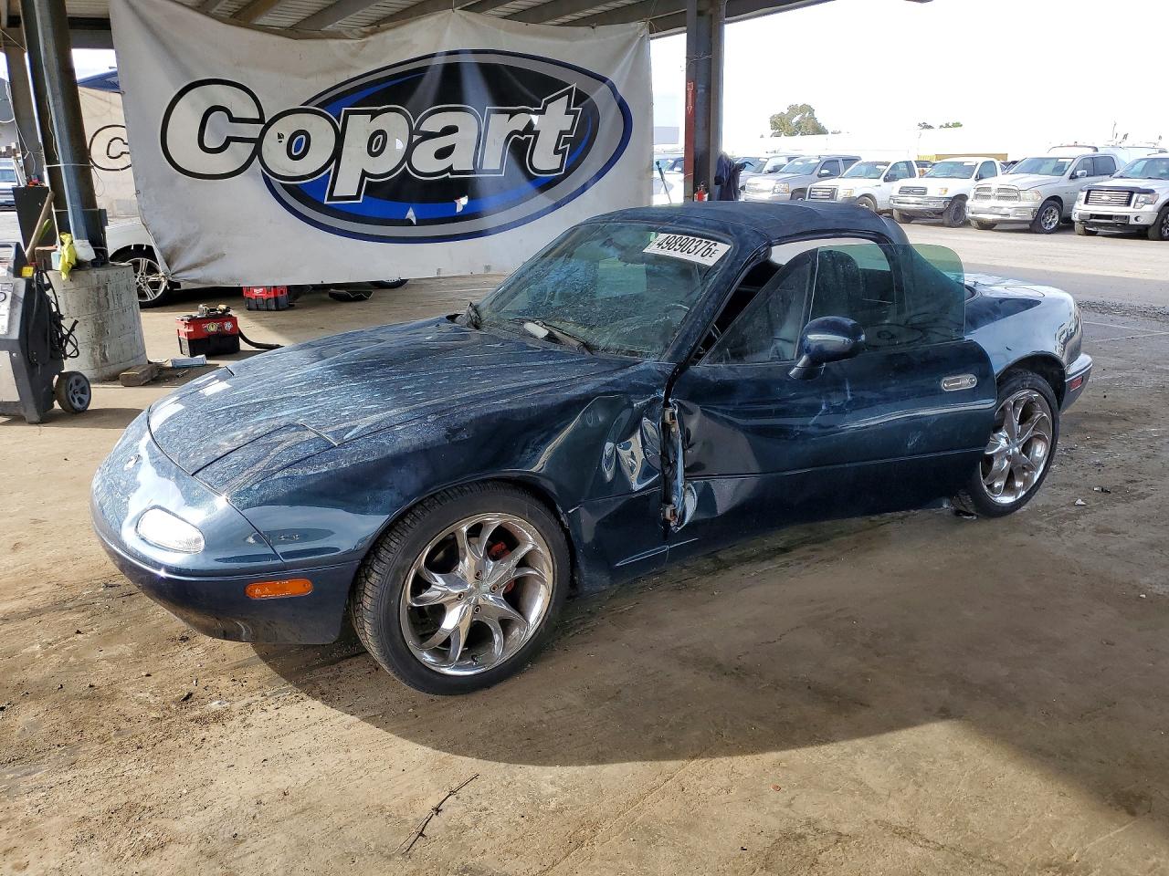 1997 Mazda MX-5 Miata, VIN JM1NA3537V0726193 — Side