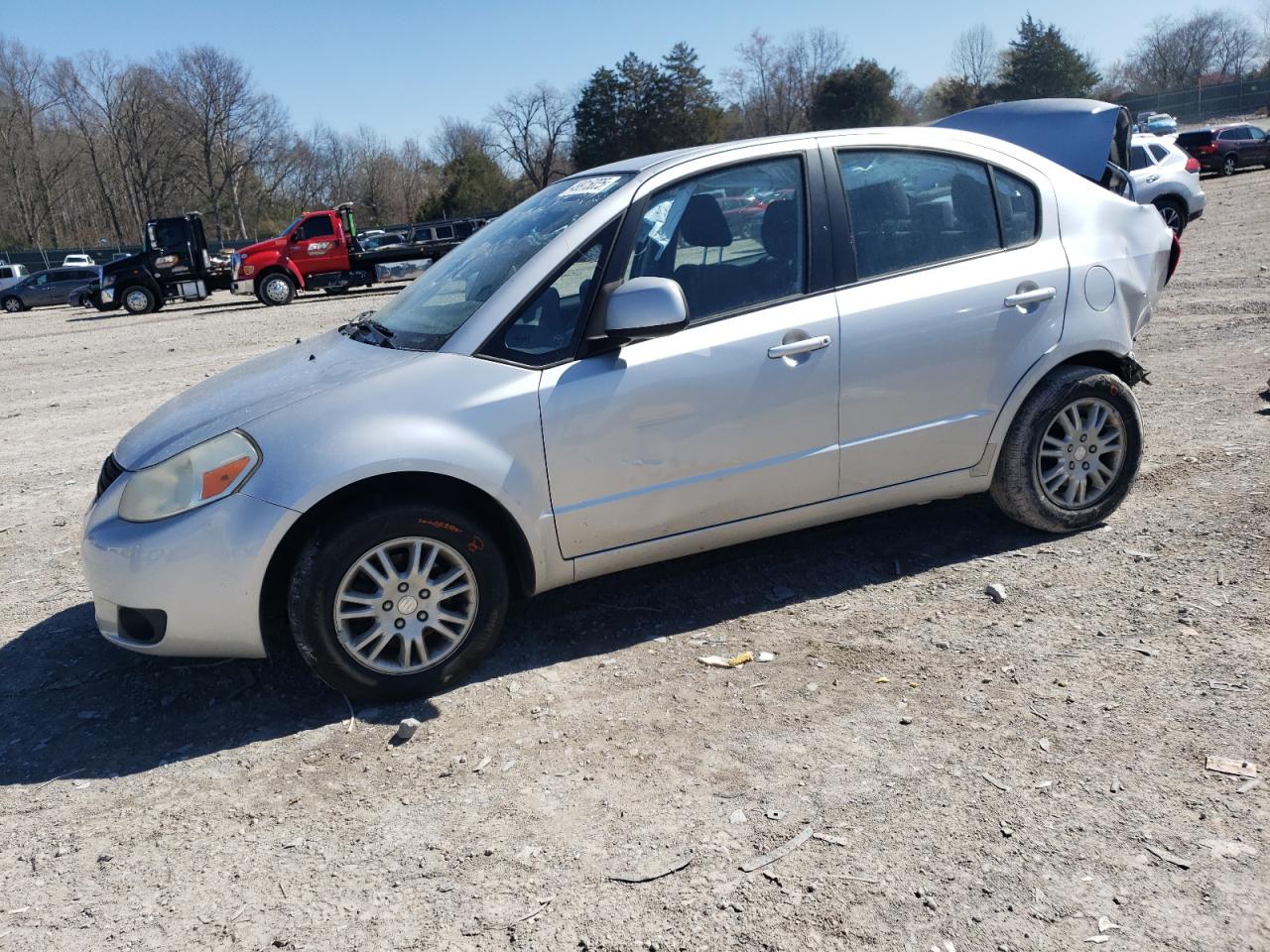 2012 Suzuki SX4 LE, VIN JS2YC5A38C6305396 — Rear end