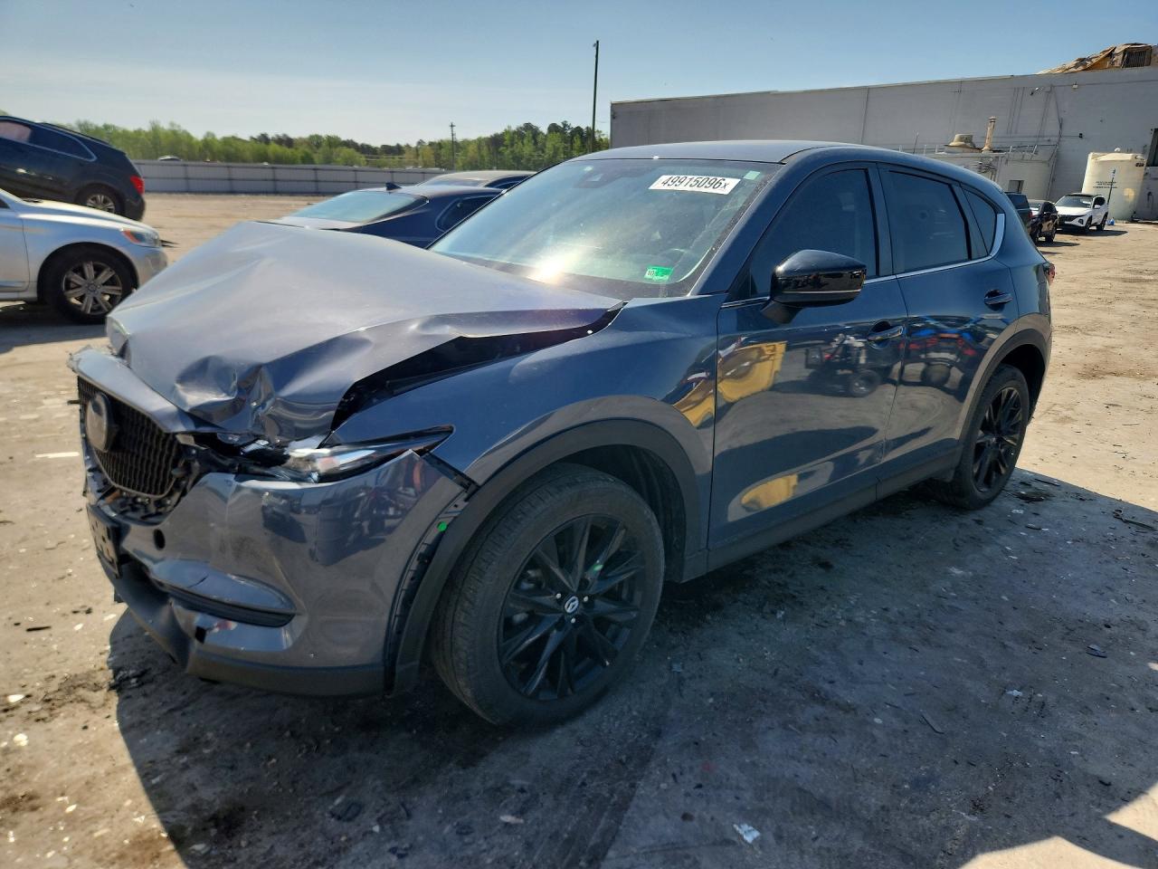 2021 Mazda CX-5 Touring, VIN JM3KFBCM8M0327700 — Front end