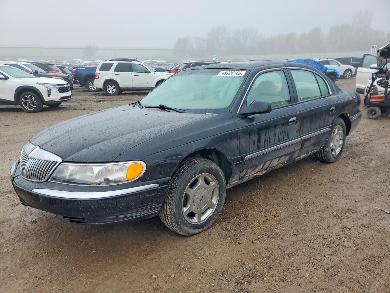 1999 Lincoln Continental, VIN 1LNHM97V8XY705097 — Перед