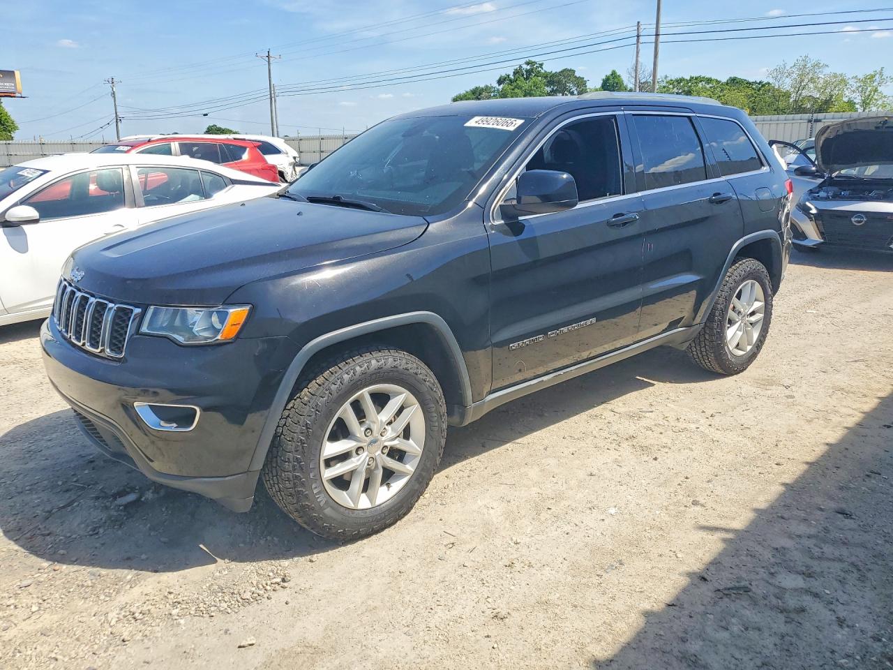 2018 Jeep Grand Cherokee Altitude, VIN 1C4RJFAG9JC313423 — Side