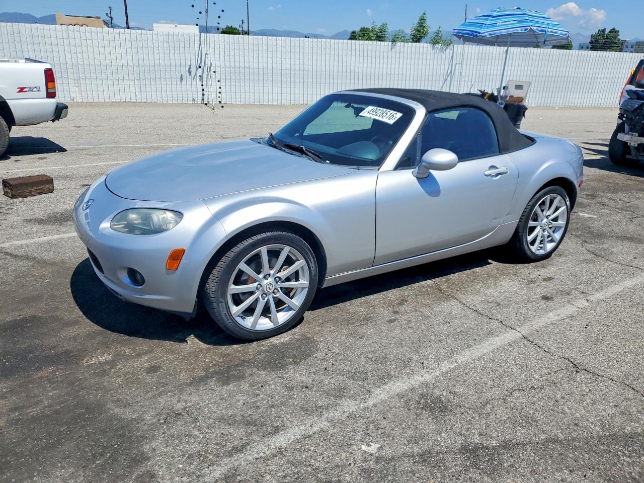 2006 Mazda MX-5 Miata Touring, VIN JM1NC25FX60115252 — Minor dents and scratches