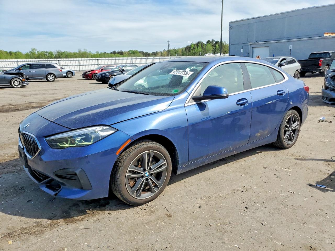 2022 BMW 2 Series 228i xDrive, VIN WBA73AK07N7K41297 — Side