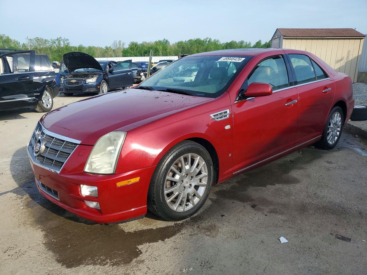 2009 Cadillac STS AWD, VIN 1G6DD67VX90168285 — Бок