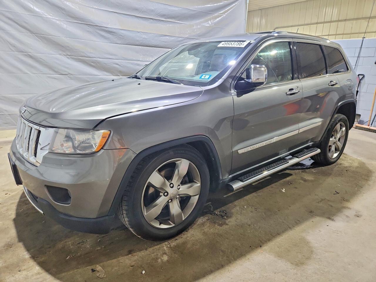 2013 Jeep Grand Cherokee Overland, VIN 1C4RJFCT6DC523993 — Rear end