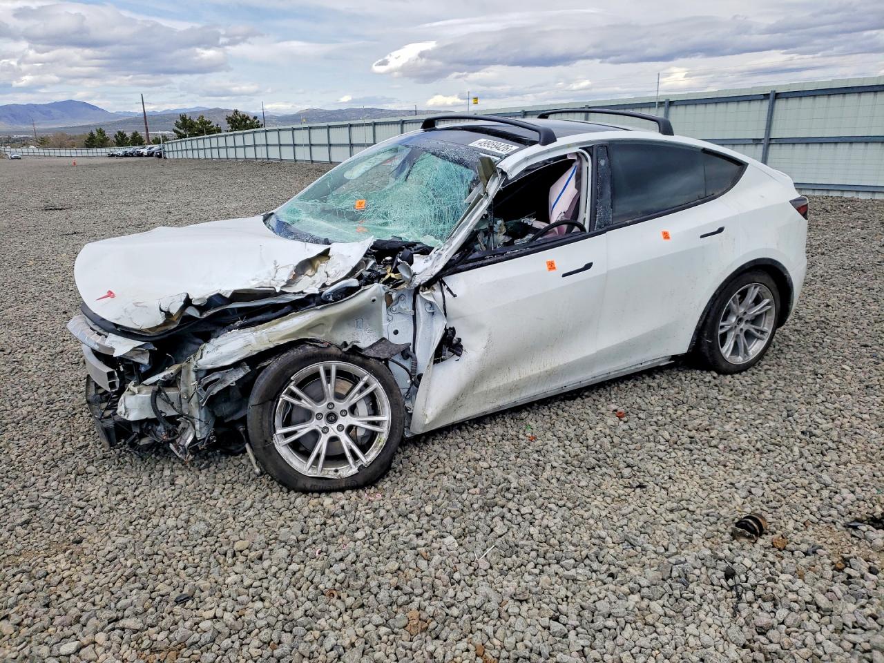 2023 Tesla Model Y Long Range, VIN 7SAYGDEE6PF711792 — Rollover
