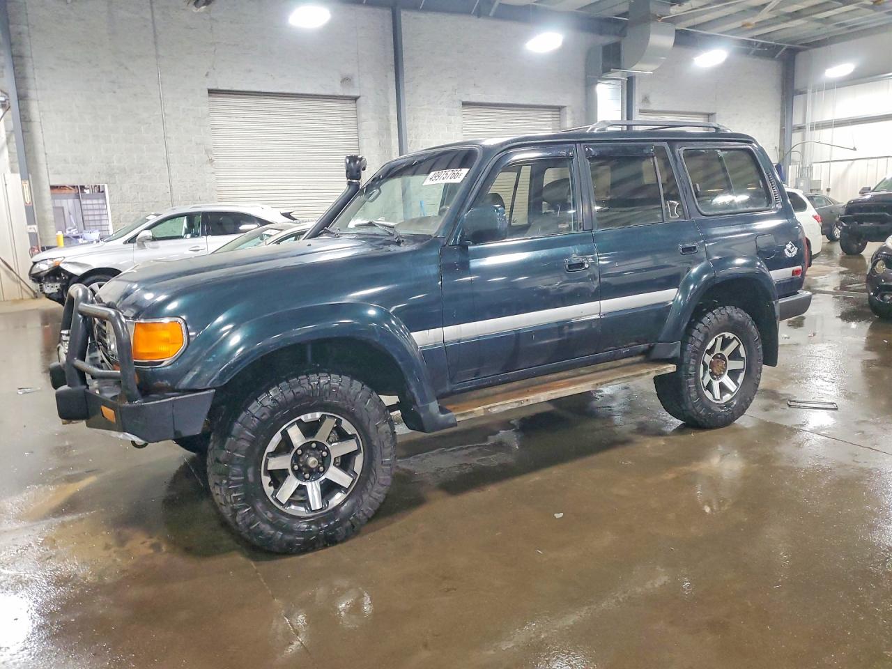 1995 Toyota Land Cruiser, VIN JT3DJ81W8S0098508 — Side