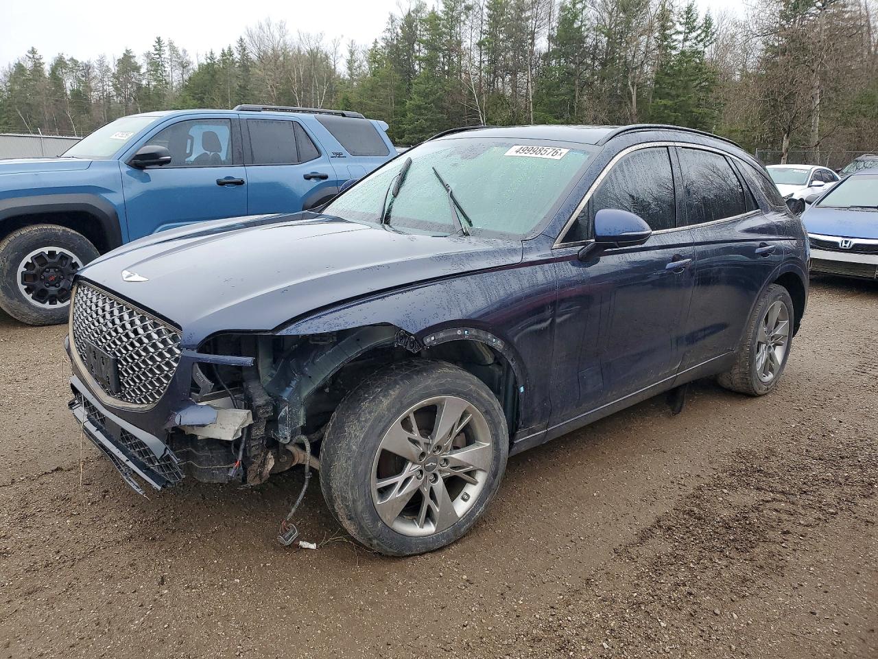 2022 Genesis GV70 2.5T, VIN KMUMADTBXNU034608 — Side