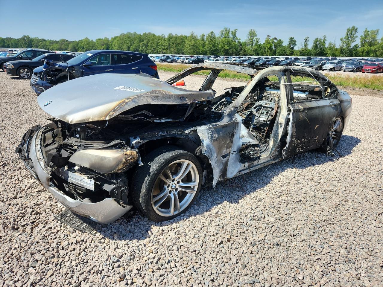 2013 BMW 7 Series 750Li, VIN WBAYE8C5XDD133208 — Burn