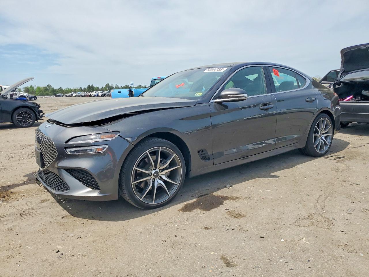 2022 Genesis G70 2.0T, VIN KMTG34TA8NU103265 — Front end