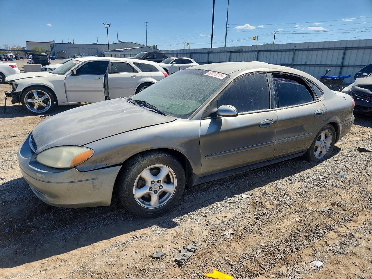 2002 Ford Taurus SE Standard, VIN 1FAFP53UX2A190538 — Side