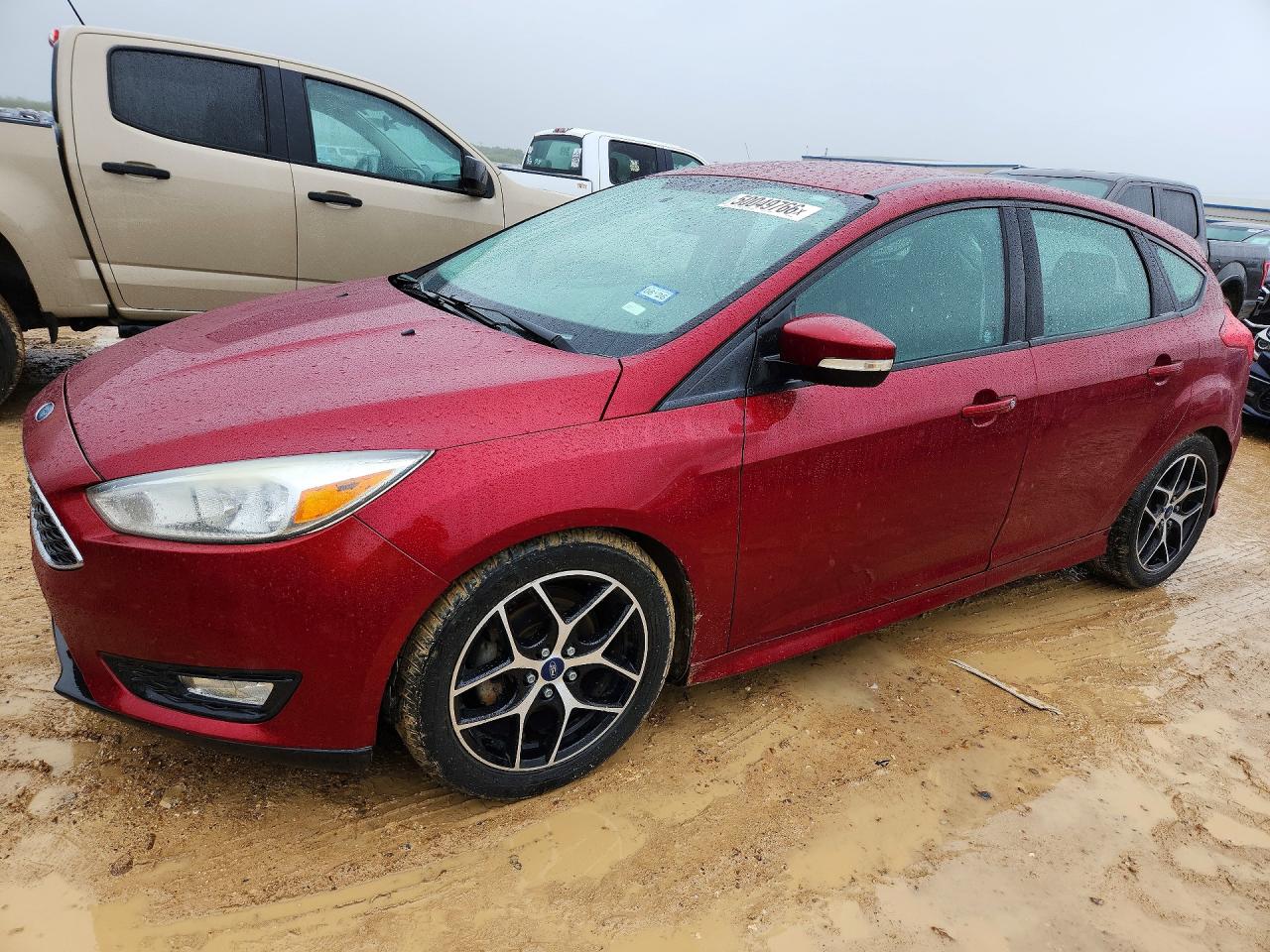 2016 Ford Focus SE, VIN 1FADP3K29GL232088 — Side