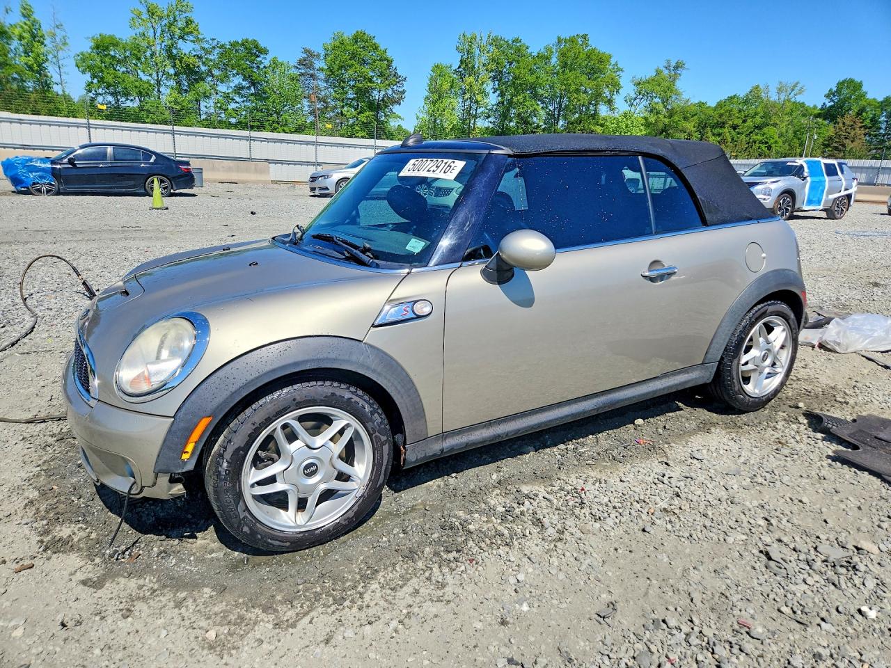 2009 MINI Convertible S, VIN WMWMS335X9TY08210 — Undercarriage