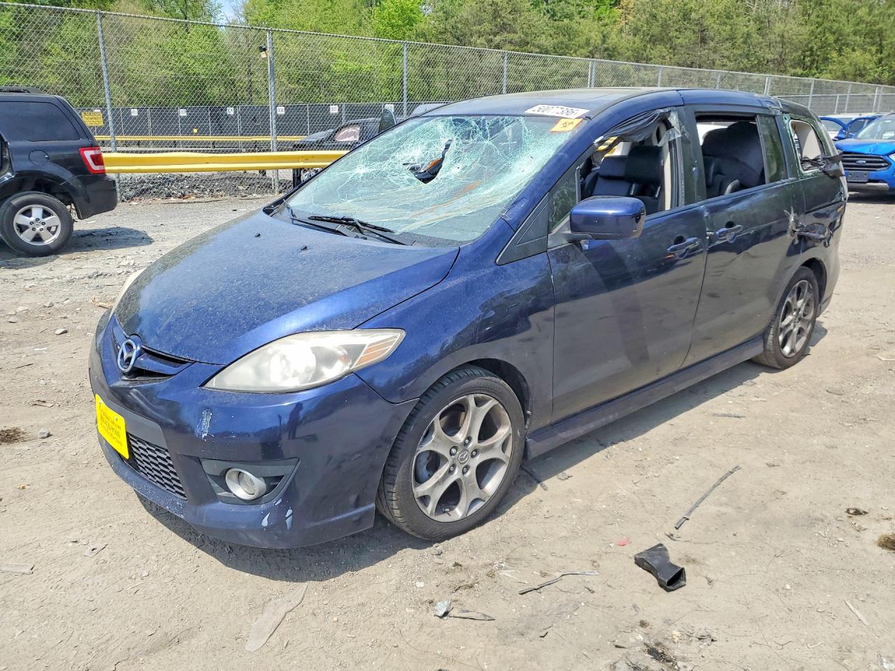 2010 Mazda 5 Sport, VIN JM1CR2W37A0386580 — Vandalism