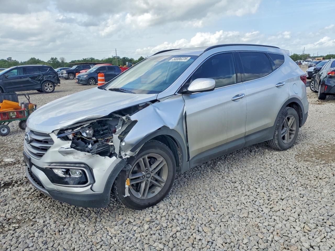 2017 Hyundai Santa Fe 2.4L, VIN 5XYZU3LB0HG432491 — Front end