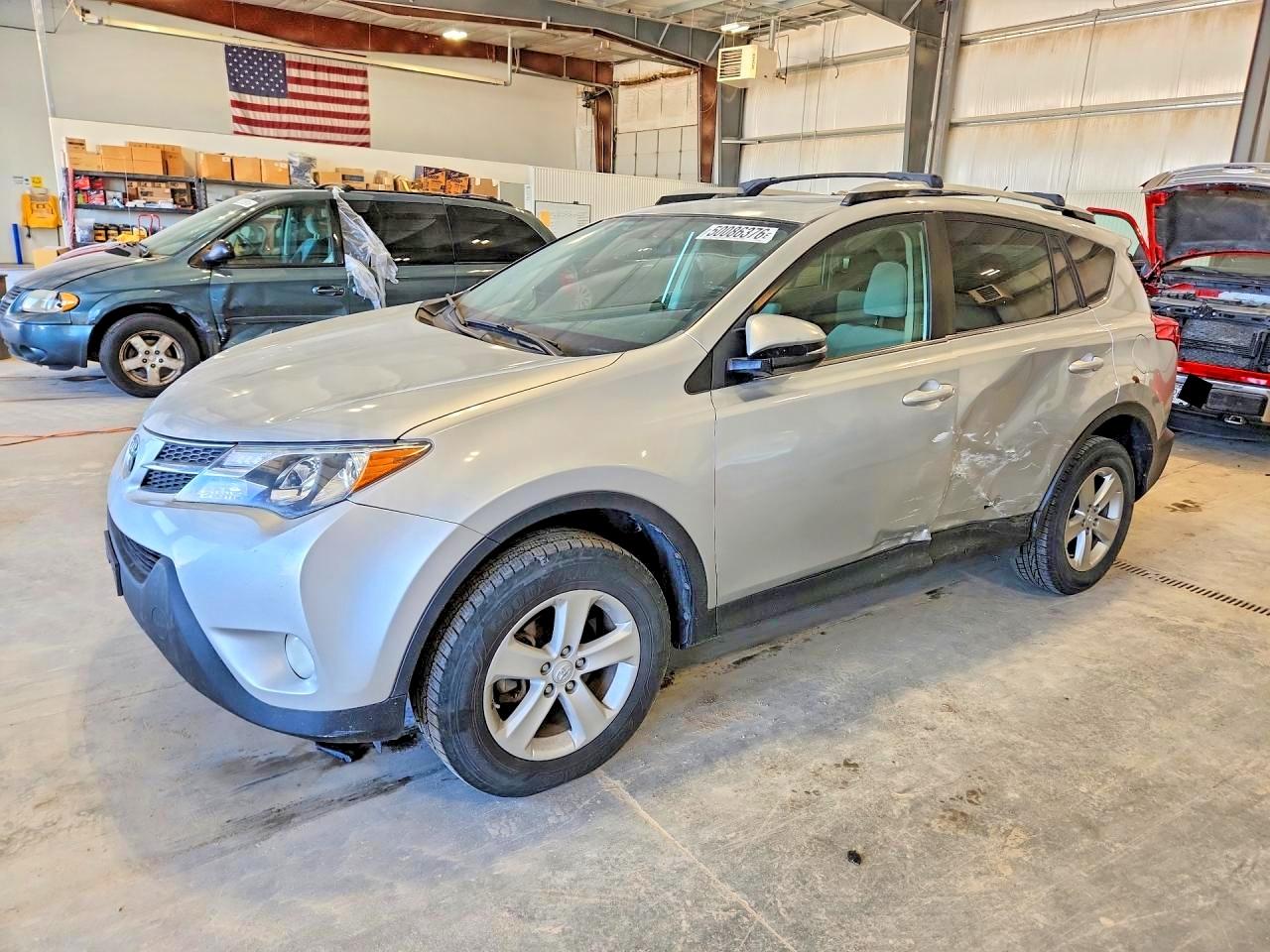 2013 Toyota RAV4 XLE, VIN JTMRFREV6DD026051 — Side