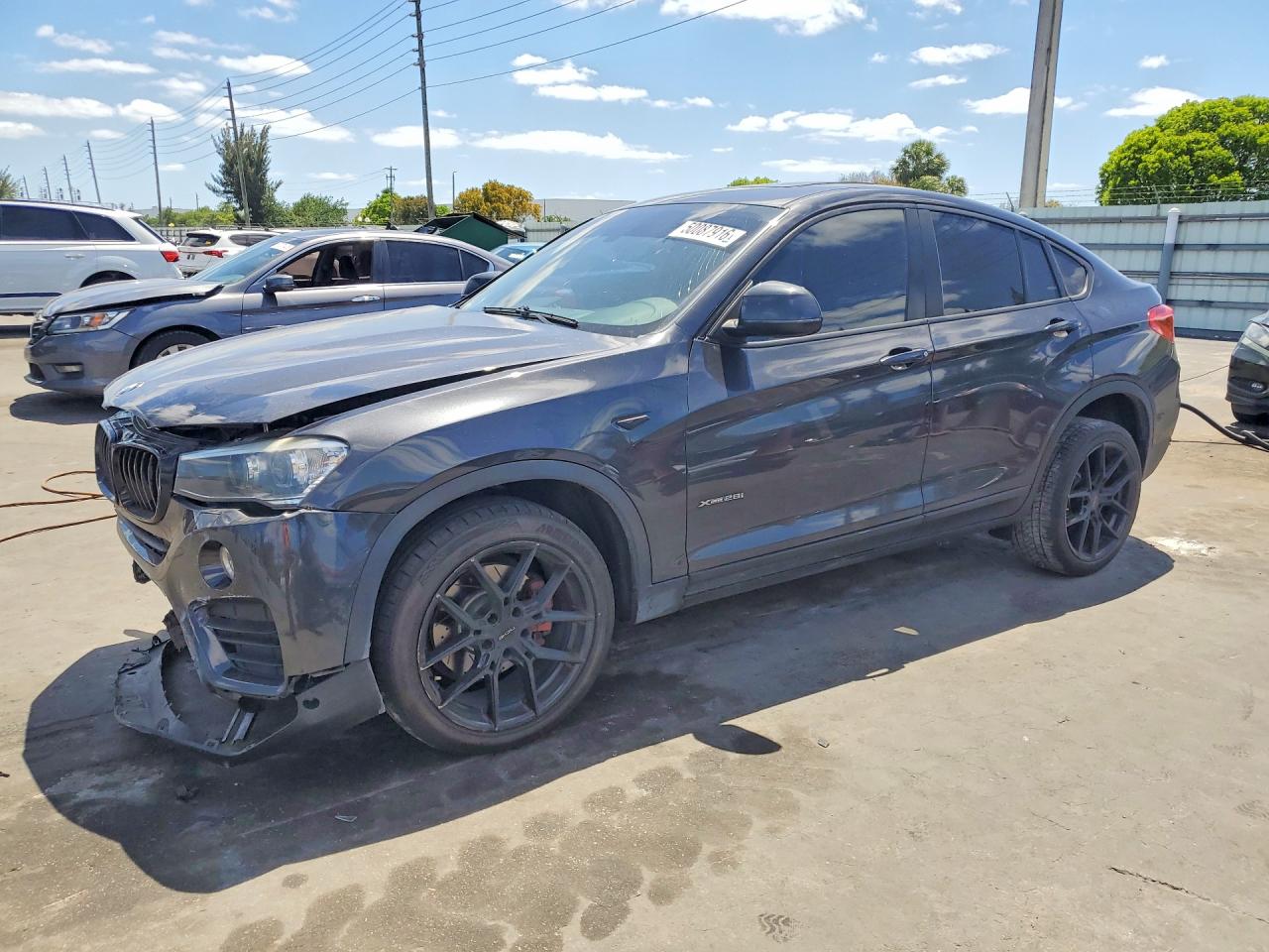 2015 BMW X4 xDrive28i, VIN 5UXXW3C53F0M87482 — Front end