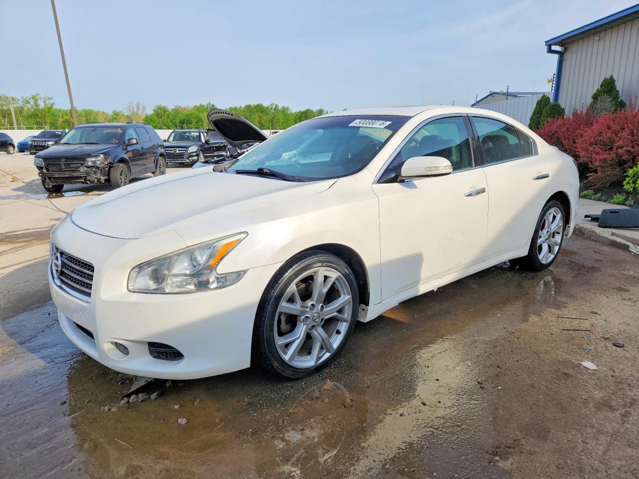 2012 Nissan Maxima S, VIN 1N4AA5AP4CC851592 — Зад