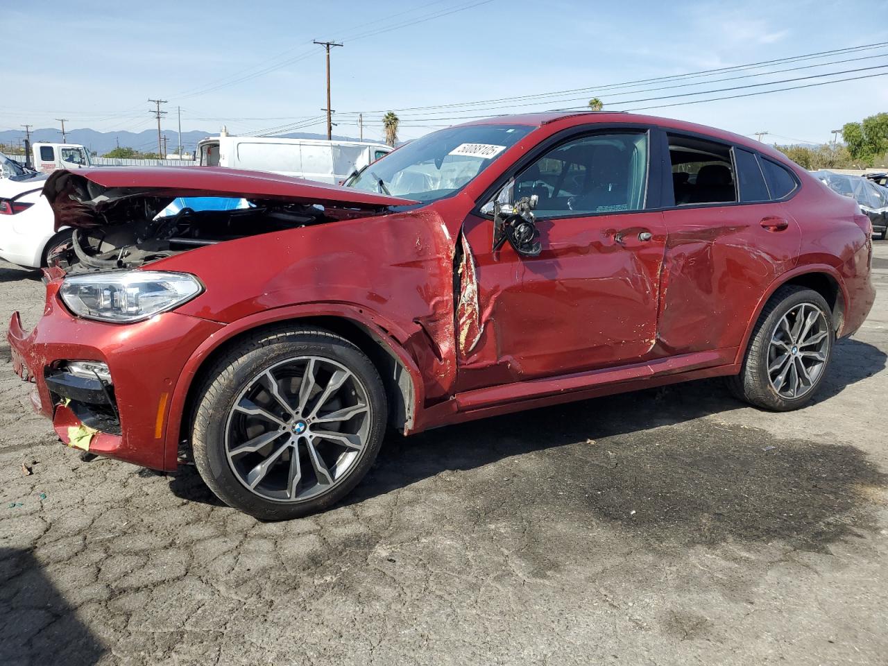 2019 BMW X4 xDrive30i, VIN 5UXUJ3C56KLG56276 — Front end