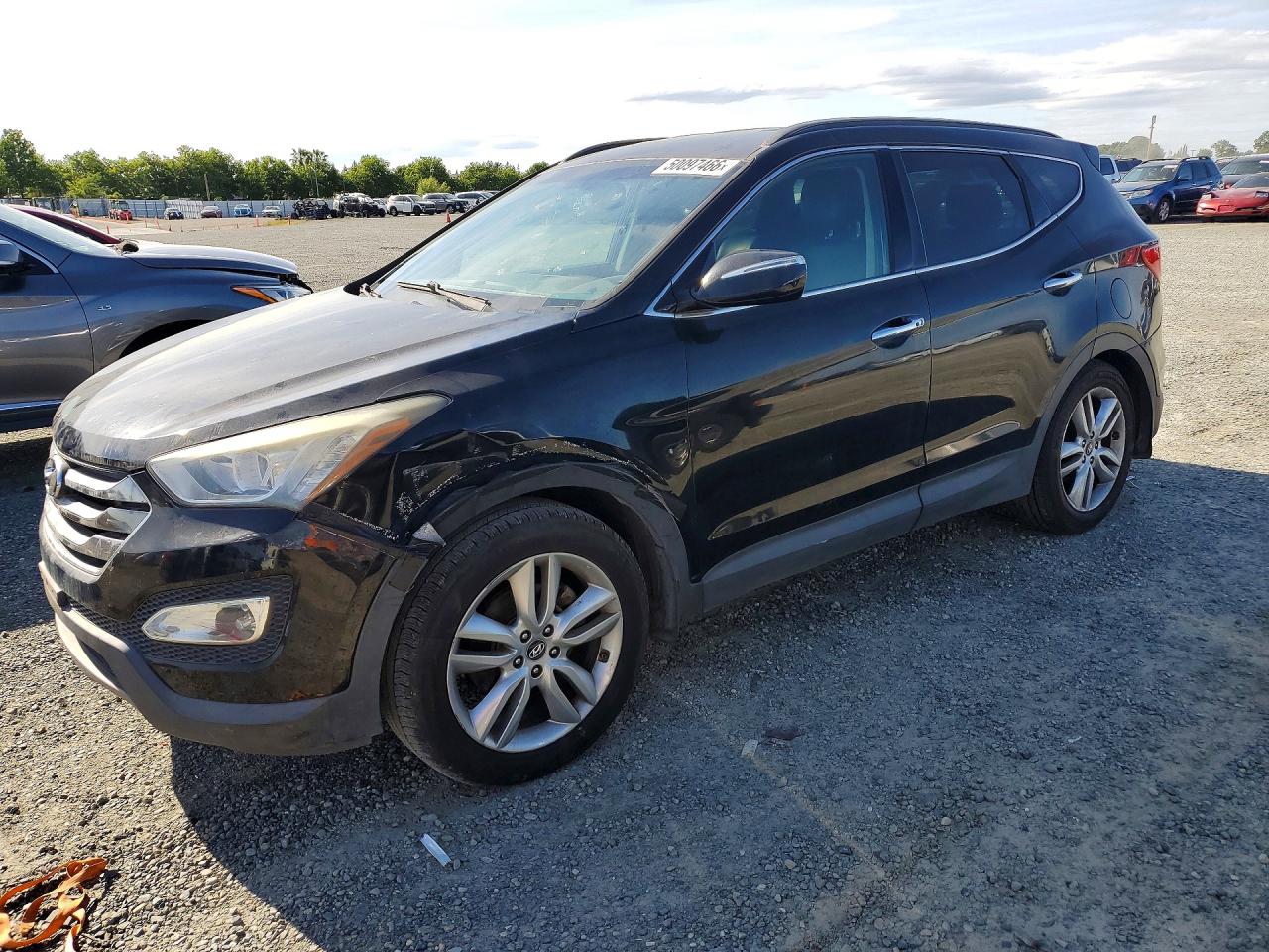 2014 Hyundai Santa Fe, VIN 5XYZU3LA2EG224177 — Minor dents and scratches