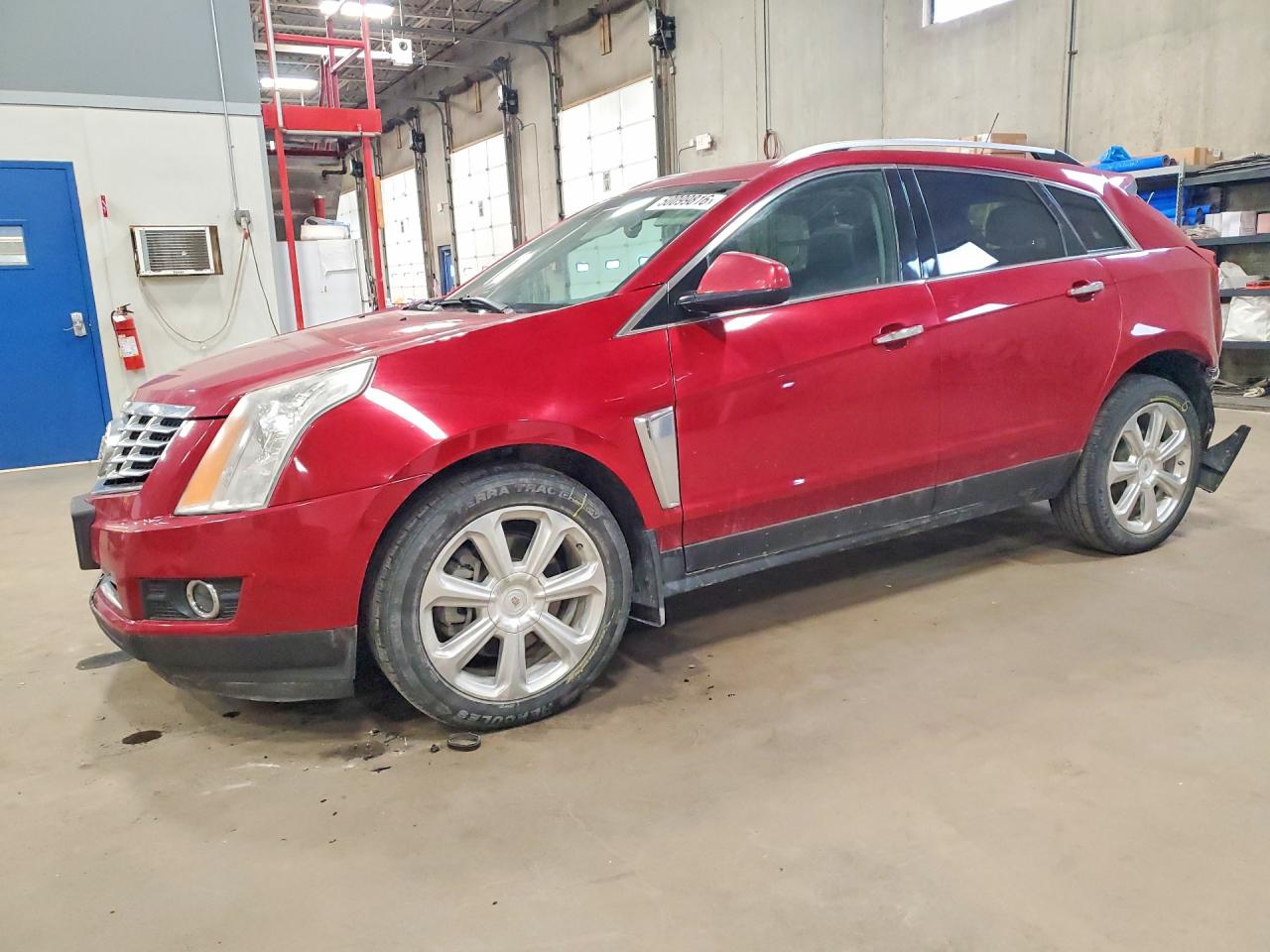 2015 Cadillac SRX Premium Collection, VIN 3GYFNGE34FS557660 — Зад