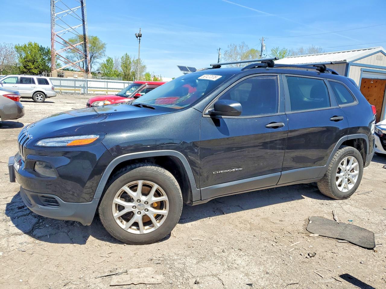 2016 Jeep Cherokee Sport, VIN 1C4PJMAB5GW140247 — Side