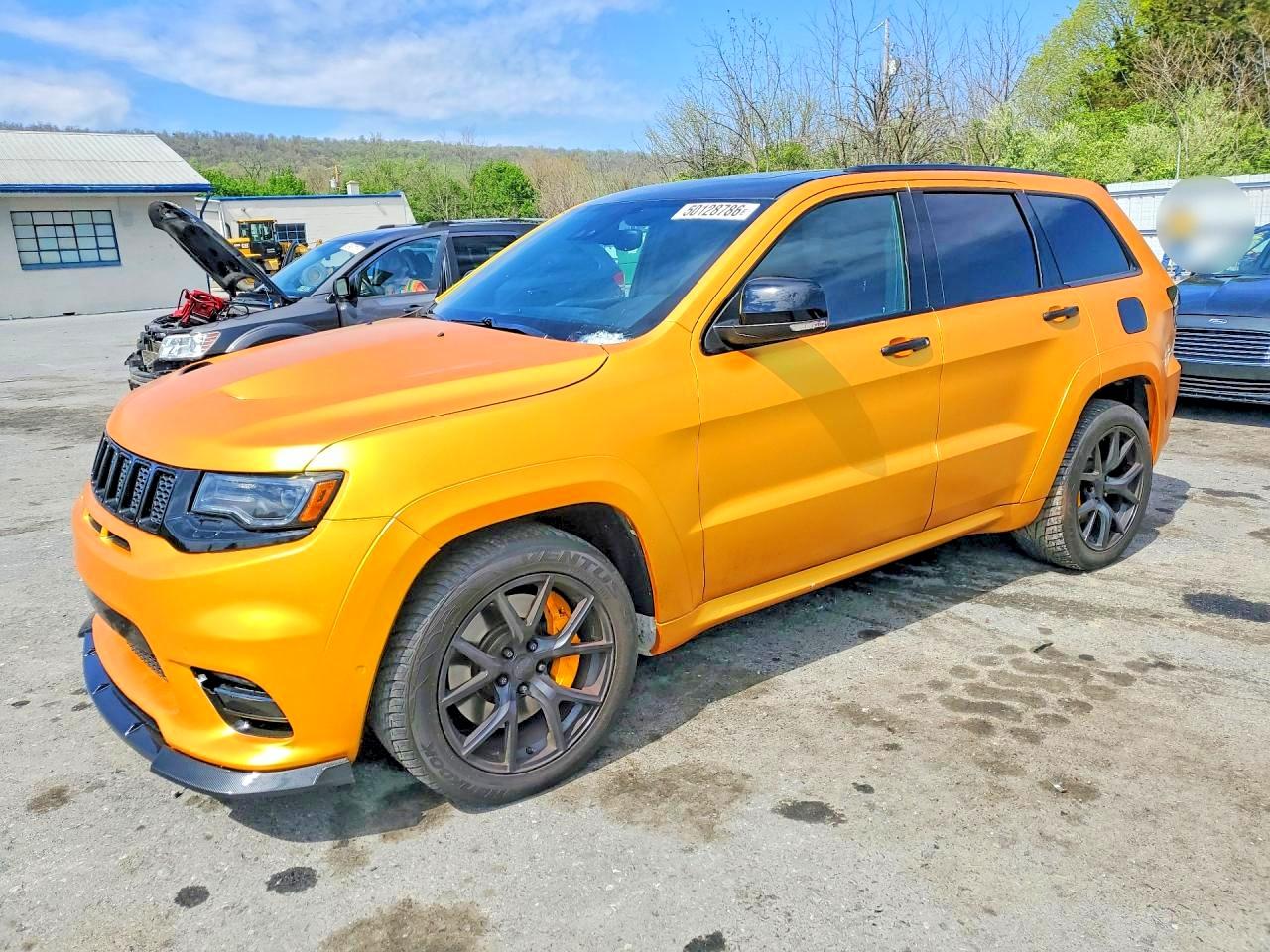 2017 Jeep Grand Cherokee SRT, VIN 1C4RJFDJXHC646117 — Minor dents and scratches