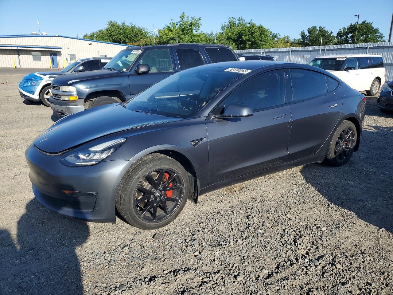2017 Tesla Model 3 Standard, VIN 5YJ3E1EA9HF002218 — Бок