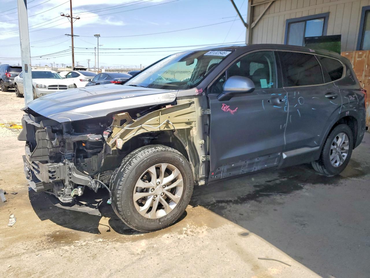 2019 Hyundai Santa Fe SE, VIN 5NMS23AD5KH036825 — Front end